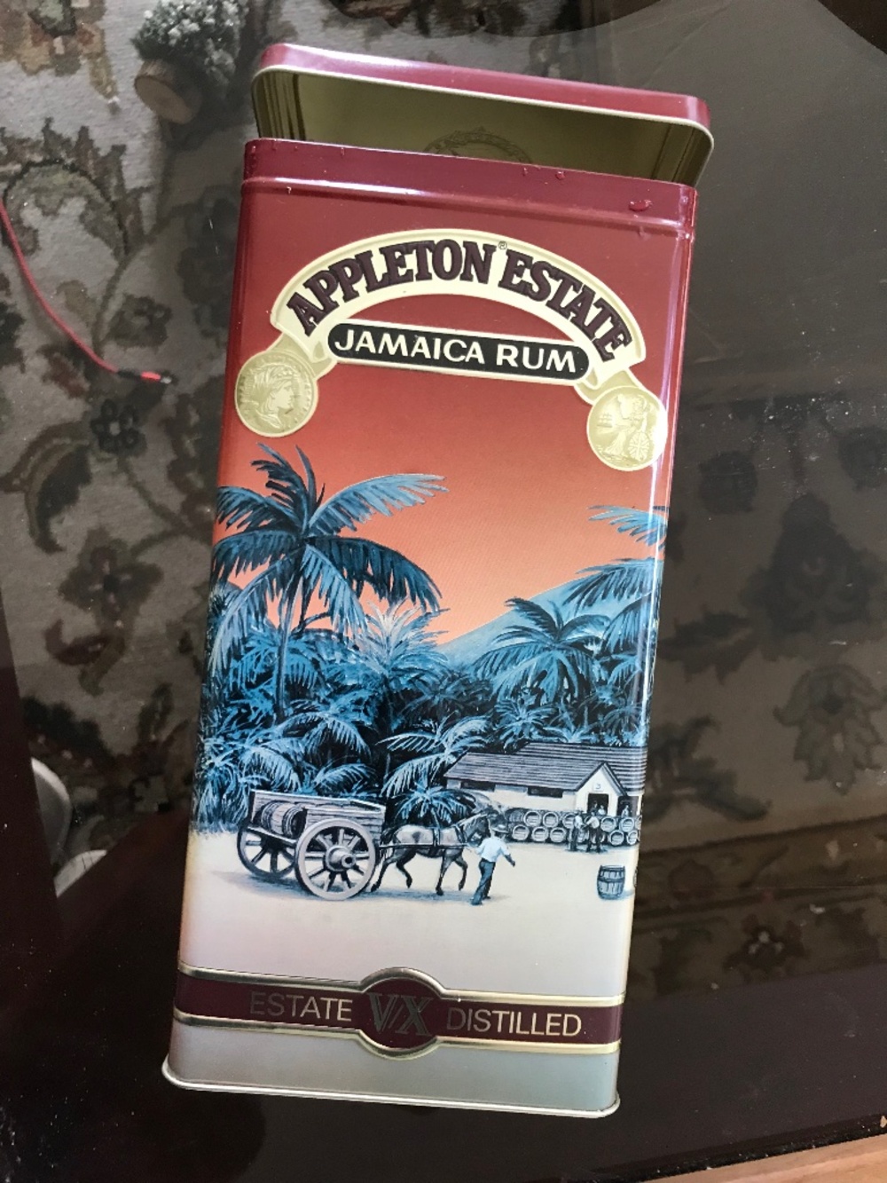 Appleton Estate Jamaica Rum Tin with a hinged lid.
